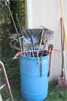 Blue Water Barrel with Garden Tools