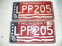2- Red Michigan License Plates
