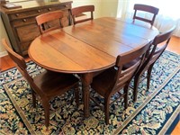 Beautiful antique dinning room table!
