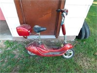Battery operated "E-scooter",w/ charger, works