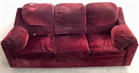 Red velvety sofa couch