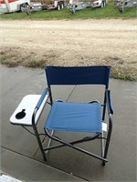Blue folding chair with beverage tray