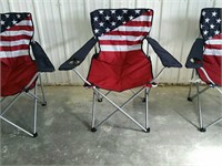 Three patriotic folding chairs.
