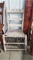 white ladder back woven seat chair