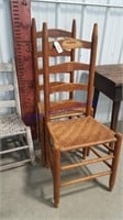2 ladder back woven seat chairs