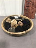 wooden bowl with string balls