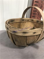 woven basket w/ cookie cutters and metal pieces