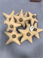 9 stuffed stars w/ bells