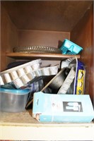 CONTENTS OF CABINET:  CANNED FOOD, BAKING TINS,