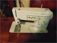 Singer Sewing Machine in sewing desk