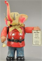 CELLULOID WIND-UP ELEPHANT ADVERTISING MAN