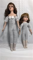 22 inch and 16 inch porcelain dolls