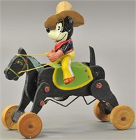 CELLULOID COWBOY MICKEY ON WOODEN HORSE