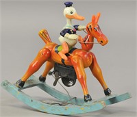 CELLULOID DONALD DUCK ON ROCKING HORSE