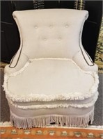 Upholstered Chair with Fringe & Bronze Tacking