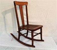 Rocking chair with cane seat