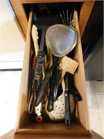 Second drawer full of kitchen utensils