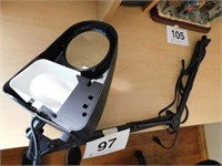Magnifying clamp on lamp with swivel head,