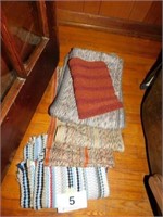 Various sized throw rugs
