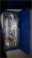 Blue metal toolbox with wrenches