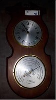 Bulova transistorized wooden wall clock