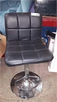 Black leather salon chair