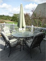 Round glass patio table w/ built in lazy susan