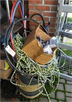 Trashcan full of scrap wire, conduit, and heavy