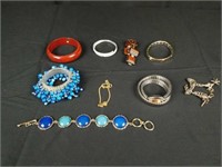 An assortment of 9 bracelets