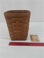 Tall Longaberger basket with brochure