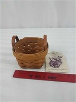 Small round Longaberger basket with brochure