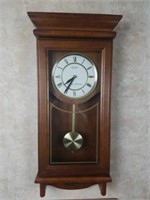 Oak wall clock with pendulum