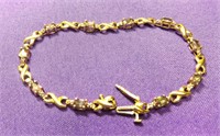 10K YELLOW GOLD BRACELET WITH DIAMOND ACCENTS