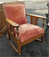 Antique cushioned rocking chair