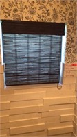 PGT solid pane impact window with blinds bathroom