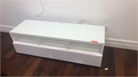 White cabinet with glass top