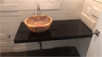 Free hanging vanity with onyx sink