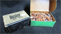 Two boxes of 38 Cal bullets.