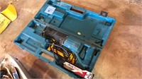 Makita sawzall with case and blades