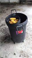Garbage can with ear corn