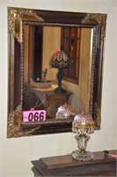 Ornate mirror and small glass Boudoir table lamp