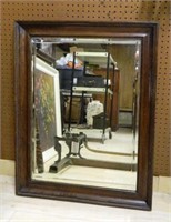 Large Oak Framed Beveled Mirror.