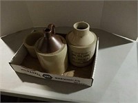 2 stoneware jugs one with advertising and one