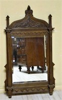 Neo Gothic Carved Oak Framed Beveled Mirror.