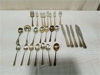 27pieces of flatware, creamer and sugar, and