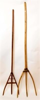 Two wooden pitch forks