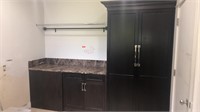 Laundry cabinets with marble tops and backslash