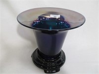 Radium blue flip 9"x 9" vase on black base.
