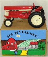 Farmall 560 Toy Farmer #1