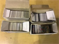 LOT OF 4 BOXES OF SPORTS CARDS